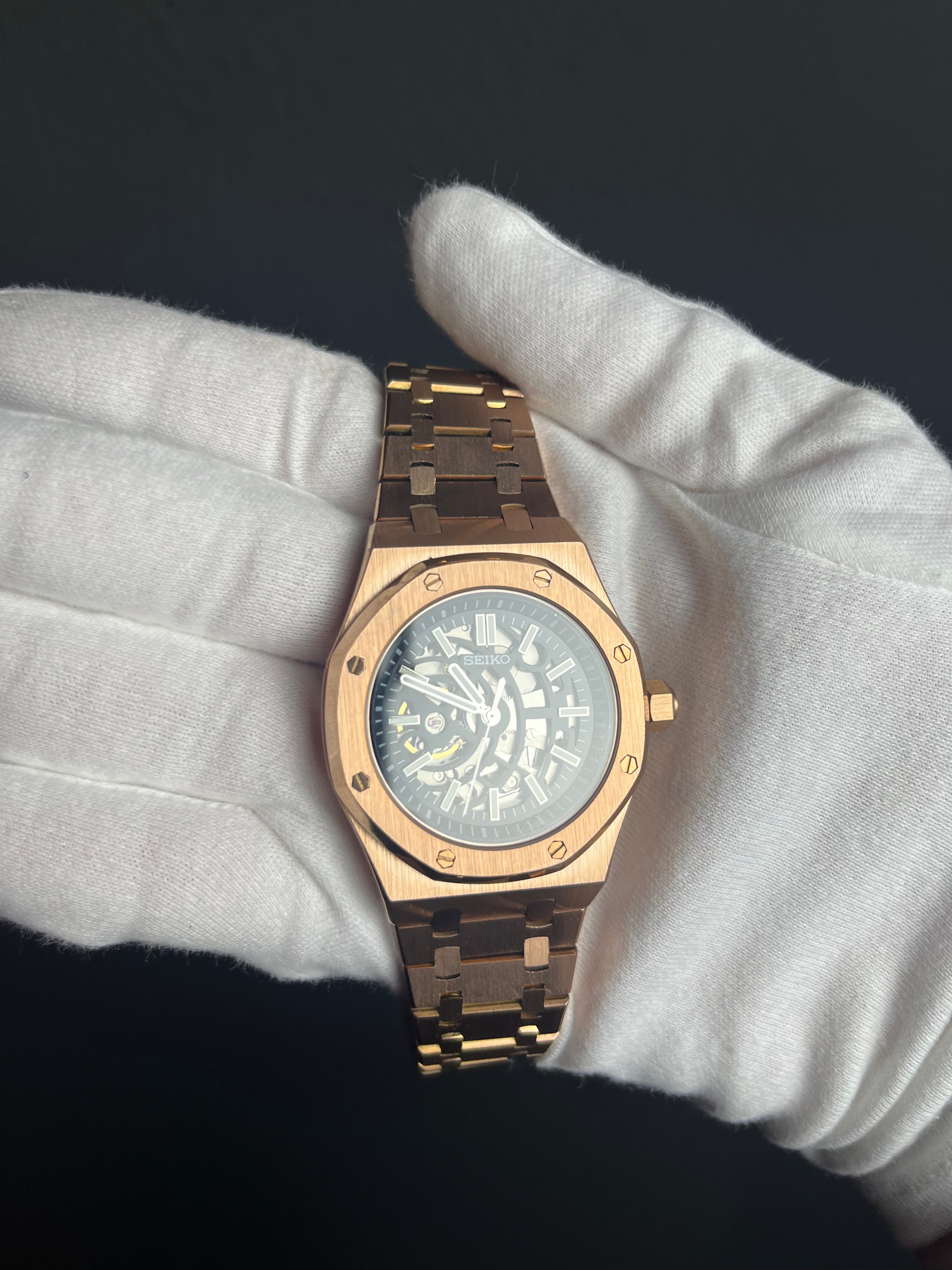 ROYAL ROSE GOLD SKELETON BLACK DIAL