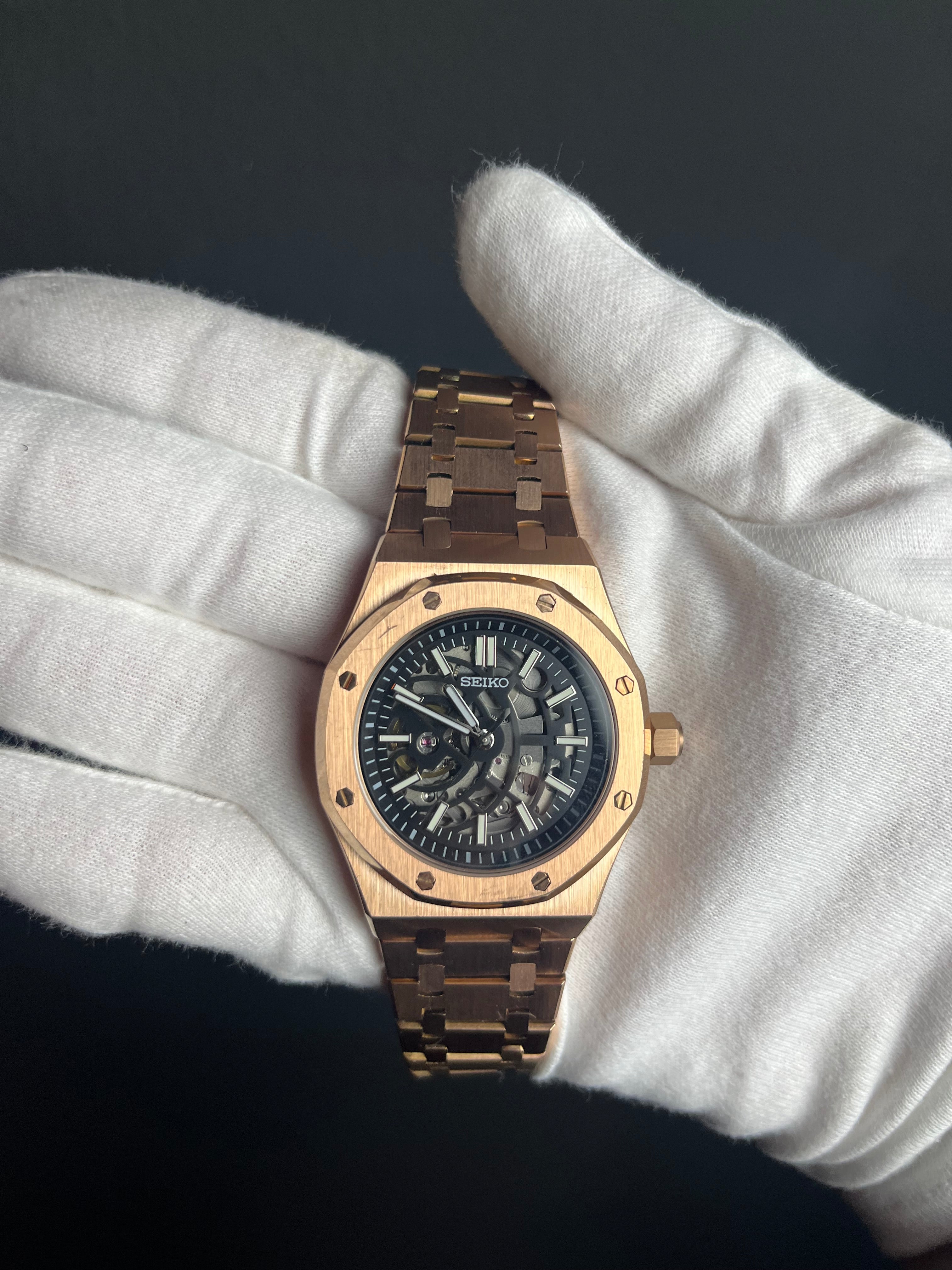 ROYAL ROSE GOLD SKELETON BLACK DIAL